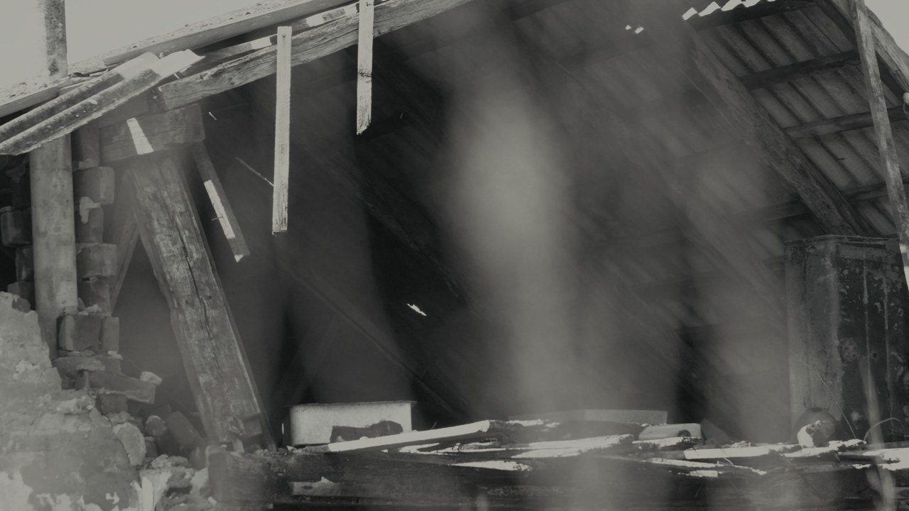 A destroyed house exposed to daylight